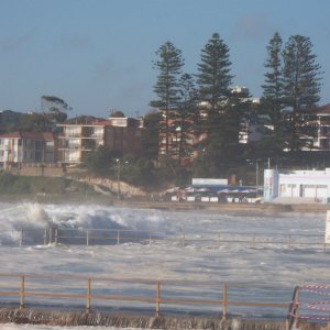 Old Cronulla Kiosk in background and blue surf club, + the old buildings at the top of the steps